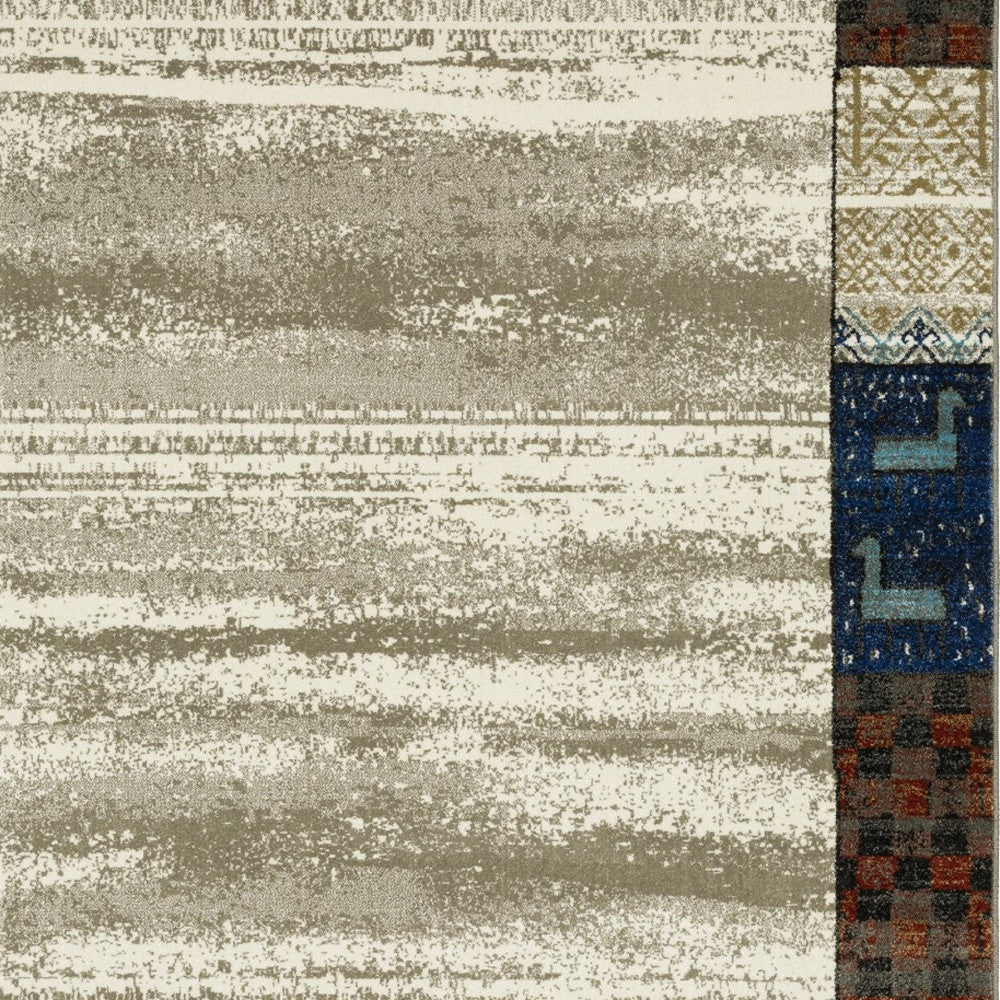 10' X 13' Ivory Tan And Blue Patchwork Area Rug