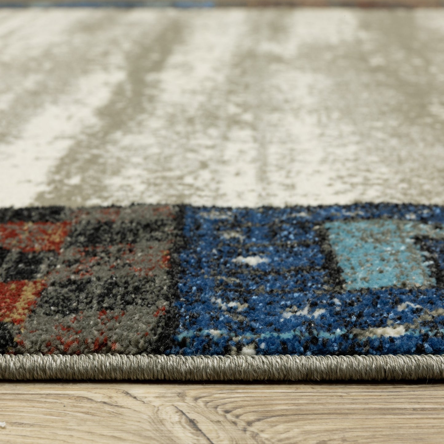 10' X 13' Ivory Tan And Blue Patchwork Area Rug