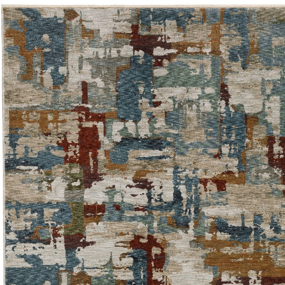 10' X 13' Beige Rust And Teal Abstract Distressed Area Rug With Fringe