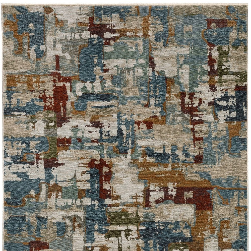 10' X 13' Beige Rust And Teal Abstract Distressed Area Rug With Fringe