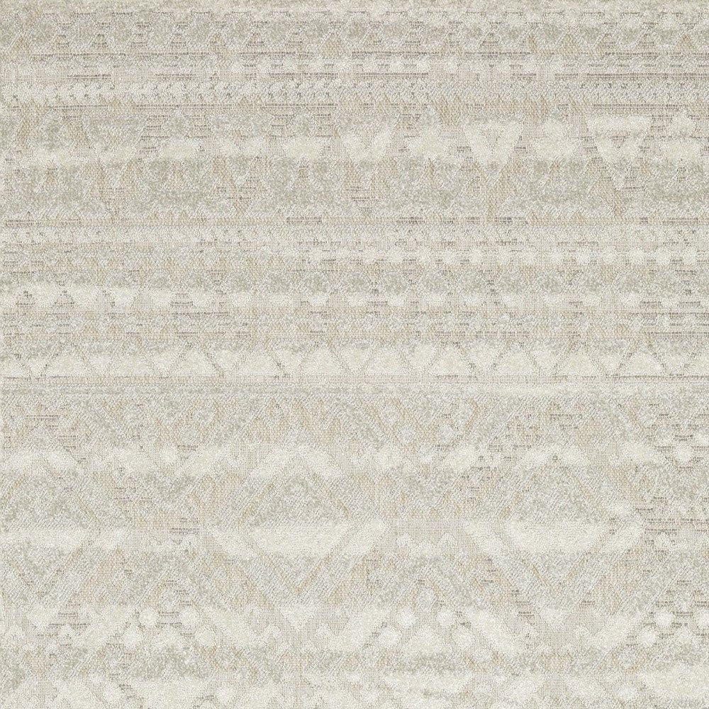 5' X 8' Beige And Ivory Tribal Area Rug