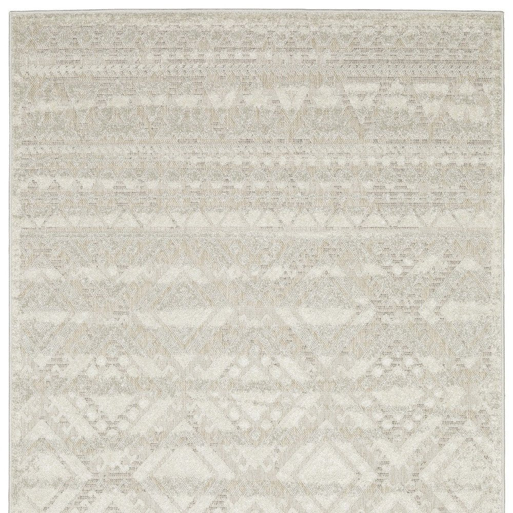 5' X 8' Beige And Ivory Tribal Area Rug