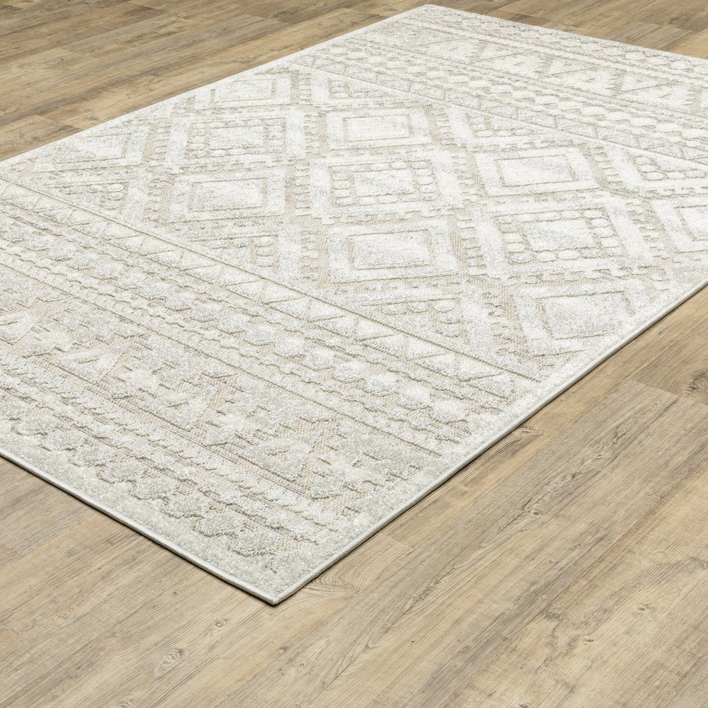 5' X 8' Beige And Ivory Tribal Area Rug