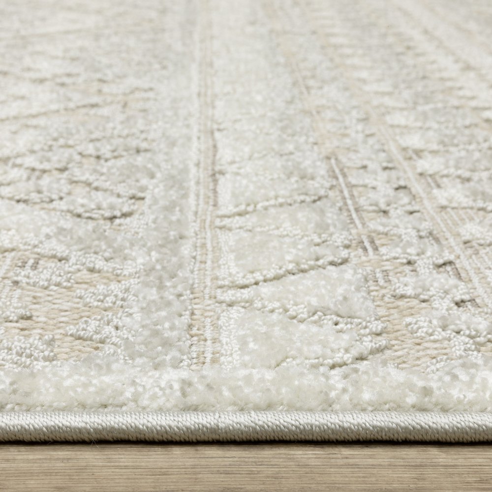 5' X 8' Beige And Ivory Tribal Area Rug