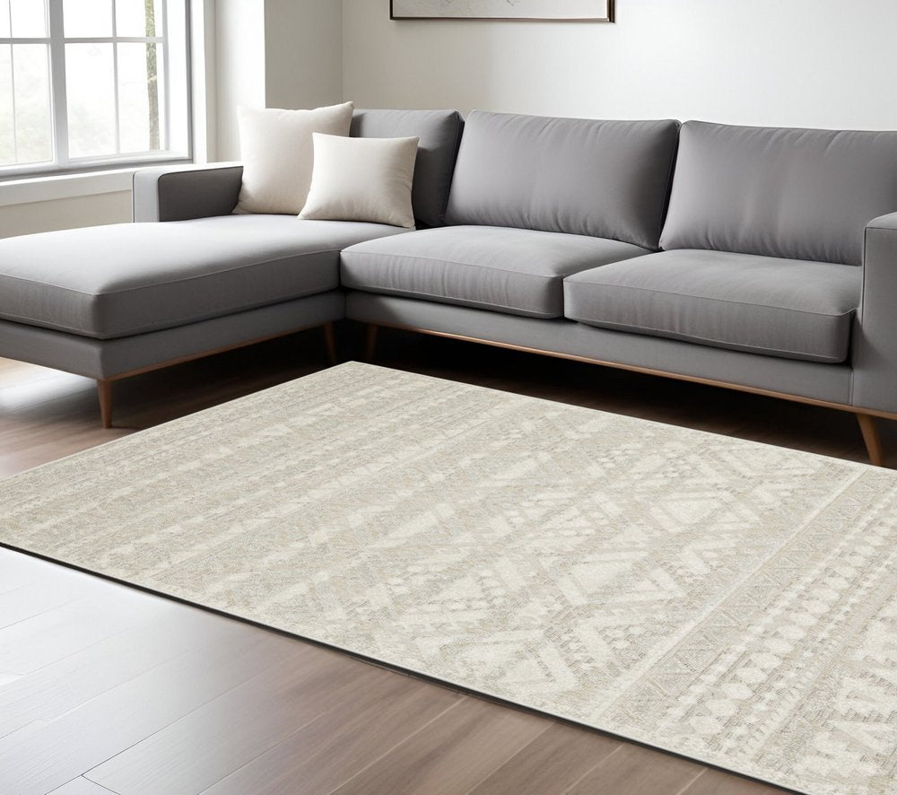 5' X 8' Beige And Ivory Tribal Area Rug