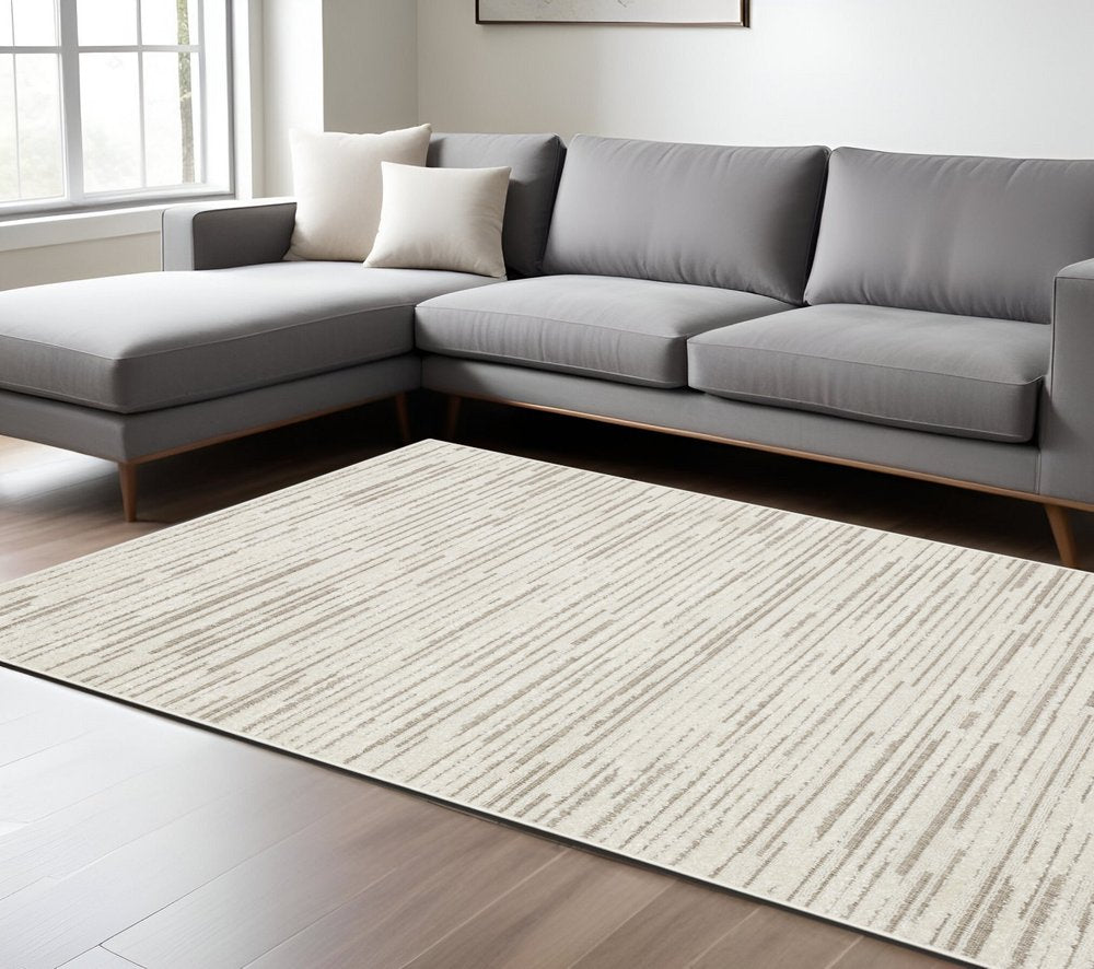 5' X 8' Ivory And Brown Striped Distressed Area Rug