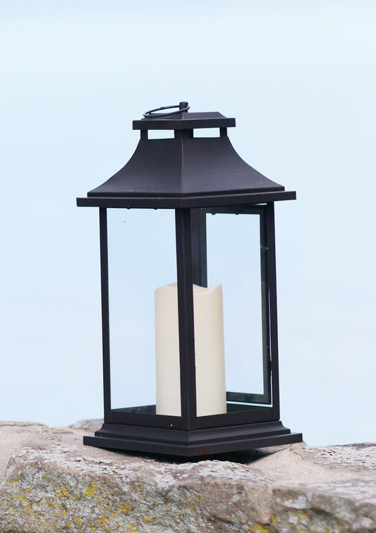 Set of Two Black Floor Lantern Candle Holders With Candles