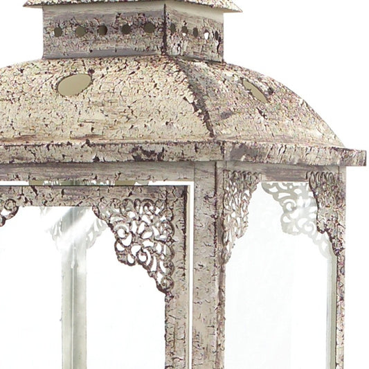 Set of Two Beige Distressed Ornate Glass And Metal Floor Lantern Candle Holders