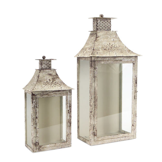 Set of Two Beige Distressed Filigree Iron And Glass Floor Lantern Candle Holders