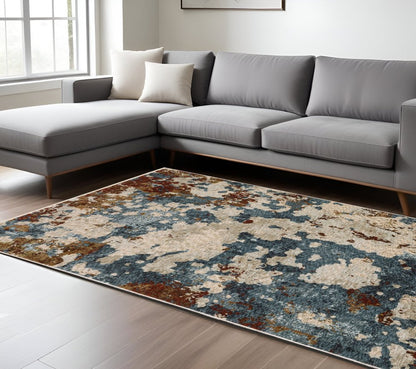 5' X 8' Beige Rust And Teal Abstract Distressed Area Rug With Fringe