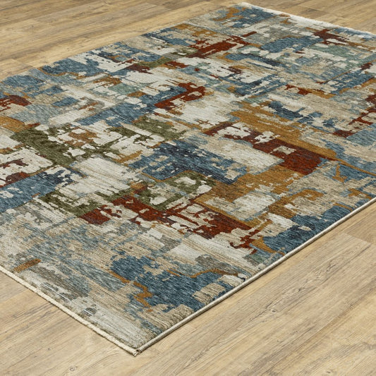 10' X 13' Beige Rust And Teal Abstract Distressed Area Rug With Fringe