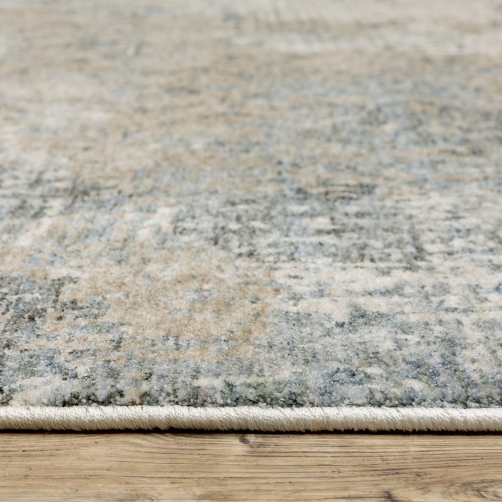 10' X 13' Beige And Blue Abstract Distressed Area Rug With Fringe