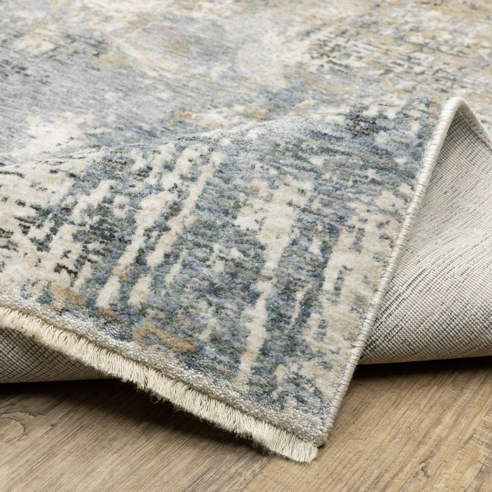 10' X 13' Beige And Blue Abstract Distressed Area Rug With Fringe