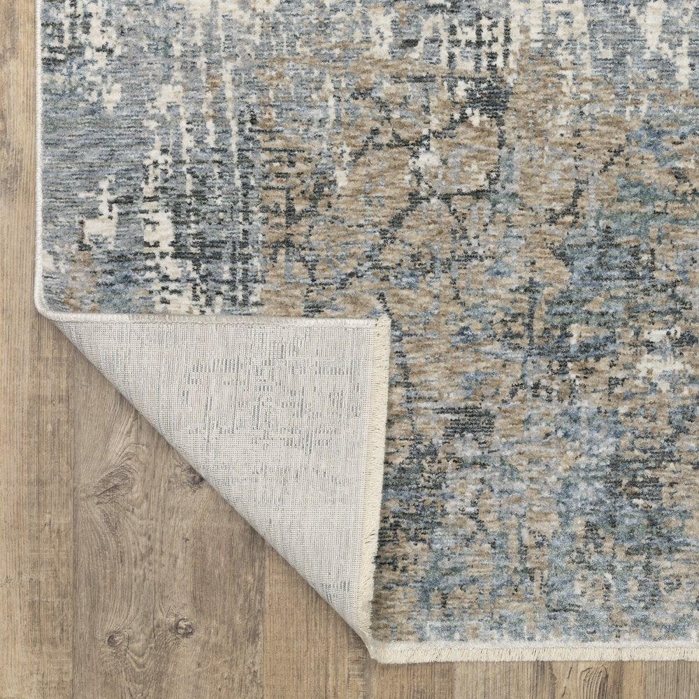 10' X 13' Beige And Blue Abstract Distressed Area Rug With Fringe