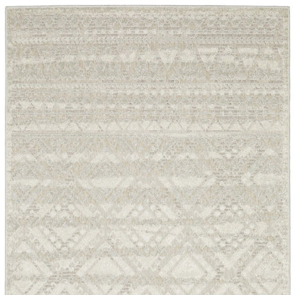 5' X 8' Beige And Ivory Tribal Area Rug