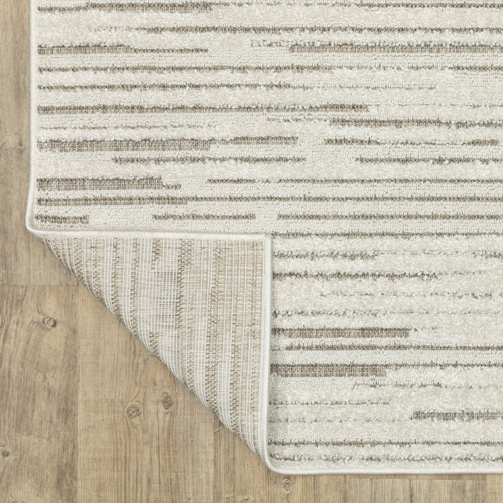 8' X 11' Ivory And Brown Striped Distressed Area Rug