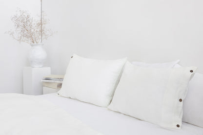 White linen bedding set with coconut buttons