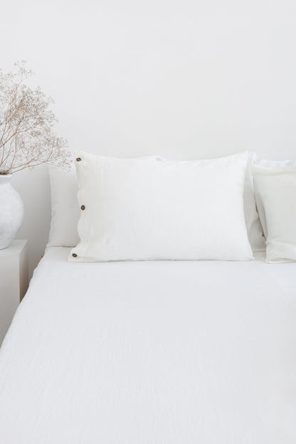 White linen bedding set with coconut buttons